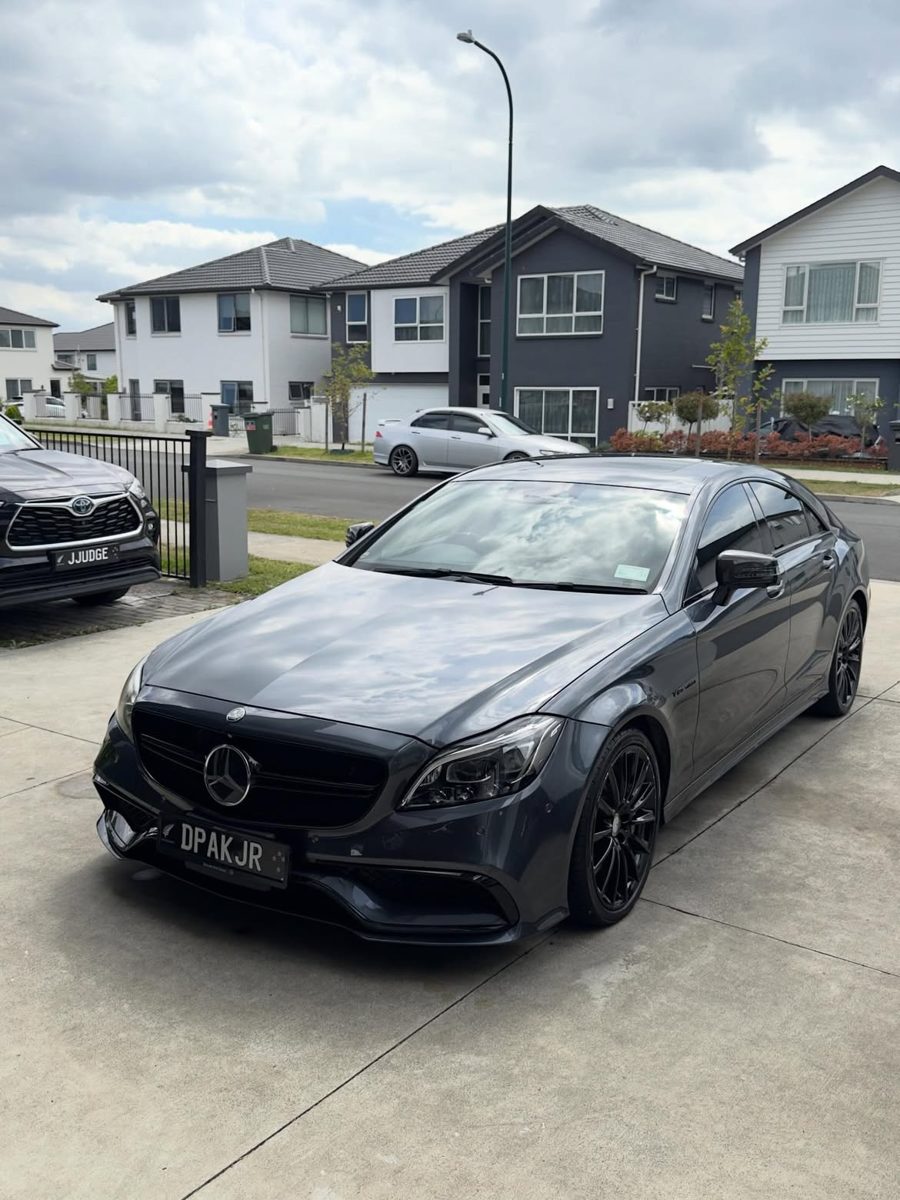 Grey Mercedes-Benz CLS63 AMG, front three-quarter