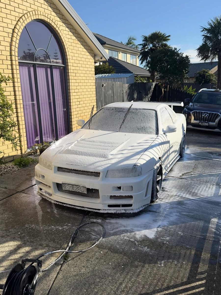 Nissan Skyline R34 GTR covered in wash foam